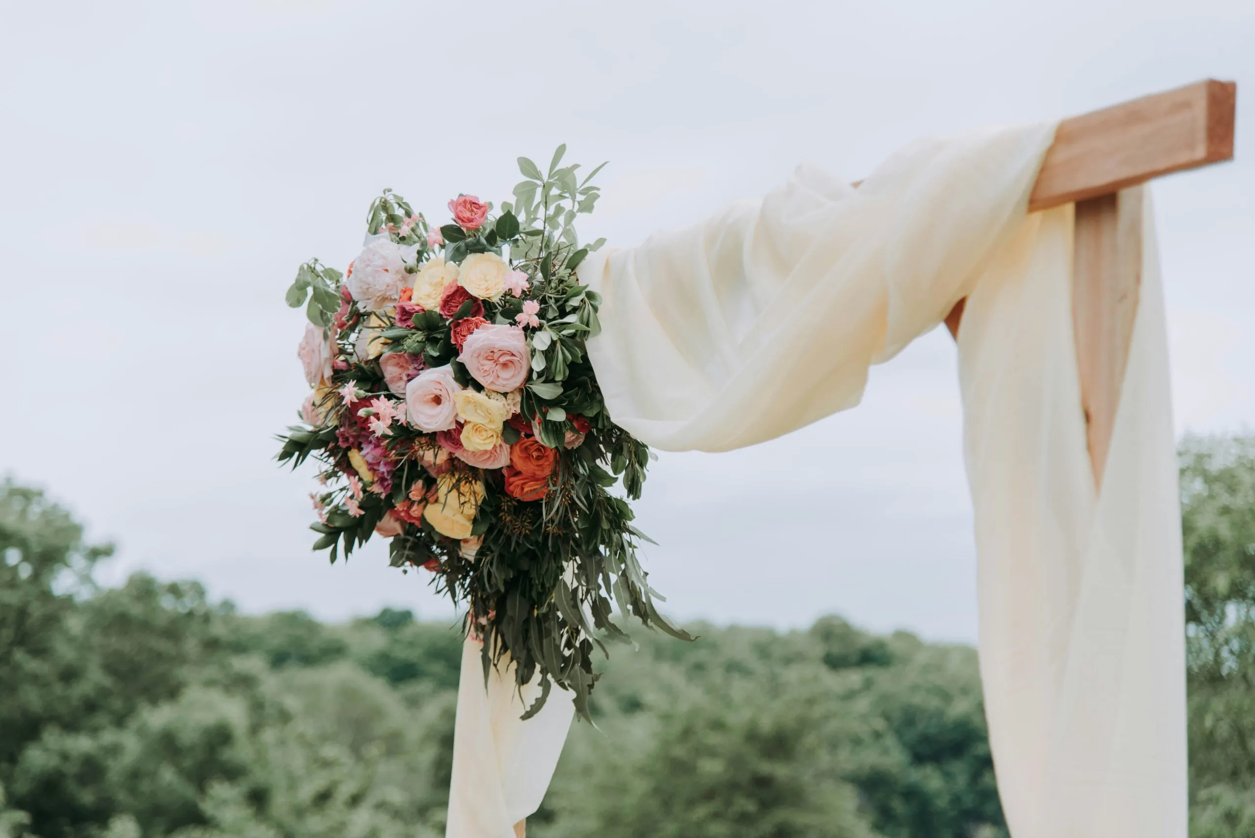 Floral arrangement on a wedding arch.